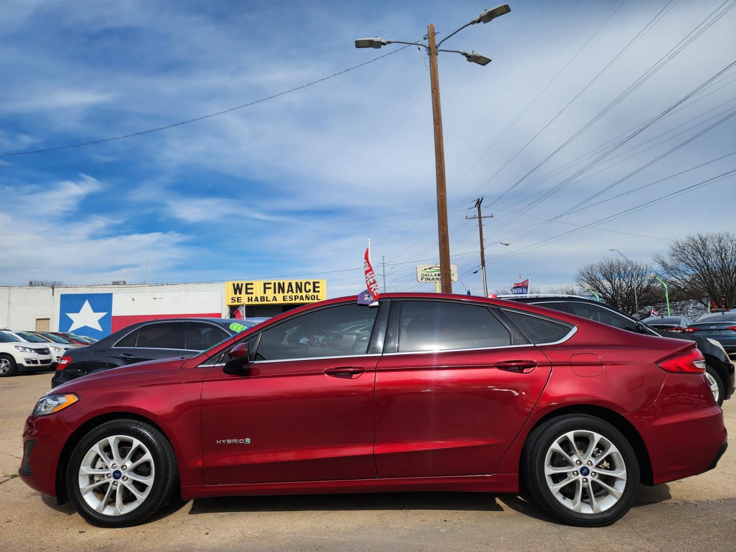 2019 RED Ford Fusion Hybrid SE (3FA6P0LU7KR) , AUTO transmission, located at 2660 S.Garland Avenue, Garland, TX, 75041, (469) 298-3118, 32.885551, -96.655602 - Welcome to DallasAutos4Less, one of the Premier BUY HERE PAY HERE Dealers in the North Dallas Area. We specialize in financing to people with NO CREDIT or BAD CREDIT. We need proof of income, proof of residence, and a ID. Come buy your new car from us today!! This is a 2019 FORD FUSION SE HYBRID - Photo#6